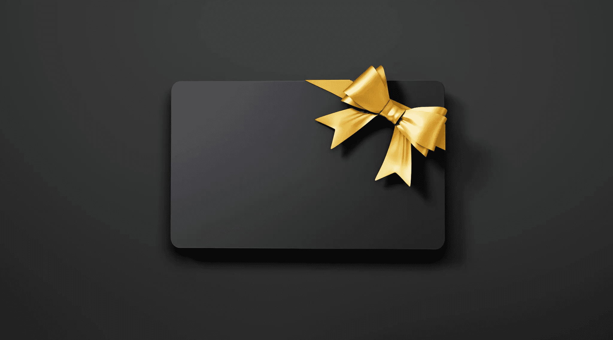 Elegant black gift card with a shiny gold bow.